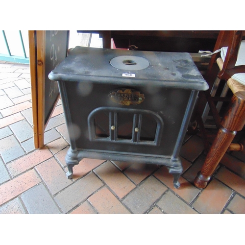 460 - Oak fire English cast iron wood burning  stove, 19.5 x 19 x 12