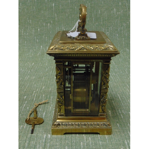 1 - Good  French antique brass cased carriage clock, having embossed decoration, enamel face and Roman n... 