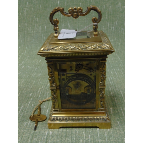 1 - Good  French antique brass cased carriage clock, having embossed decoration, enamel face and Roman n... 