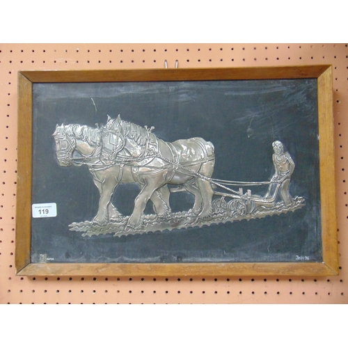 119 - Framed hand beaten pewter plaque, depicting a ploughing scene. 11 x 17.5