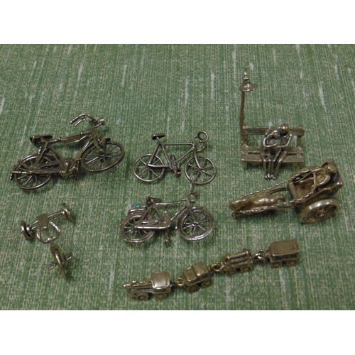 12 - Collection of miniature silver models, carriage, bicycles, etc. 2.8 oz.