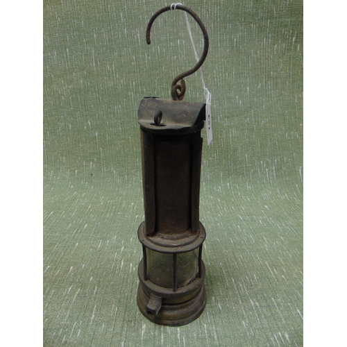 124 - Antique miner's lamp, stamped Joe Phillips.