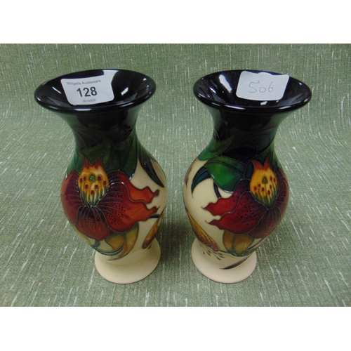 128 - Pair of Moorcroft Anna Lily pattern vases, of waisted form. Each 8