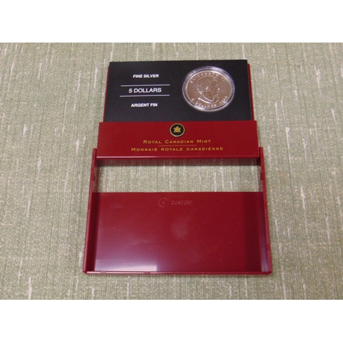 16 - Cased Royal Canadian Mint Elizabeth II 5 Dollars 2005 silver coin.