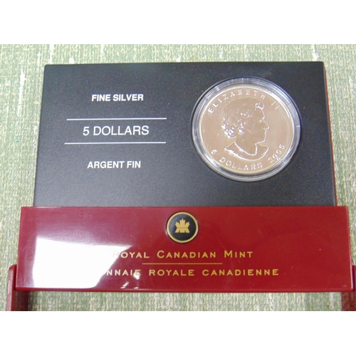 16 - Cased Royal Canadian Mint Elizabeth II 5 Dollars 2005 silver coin.