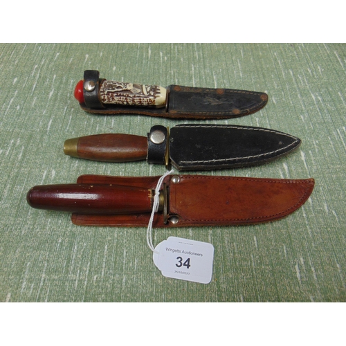 34 - William Rodgers 'Scout special' sheath knife and two others (3).