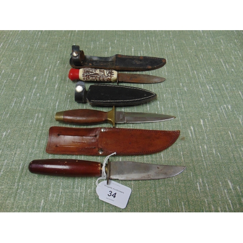 34 - William Rodgers 'Scout special' sheath knife and two others (3).