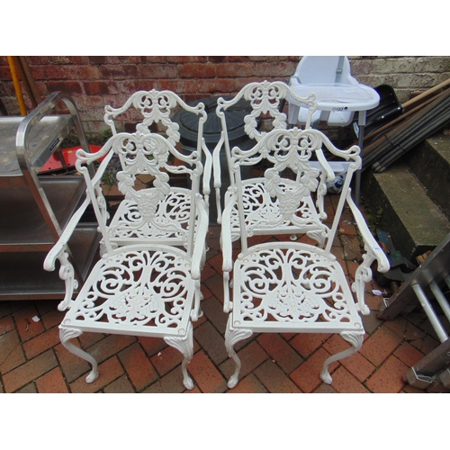 481 - Set of four reproduction  painted metal garden arm chairs, having pierced decoration and on frontal ... 