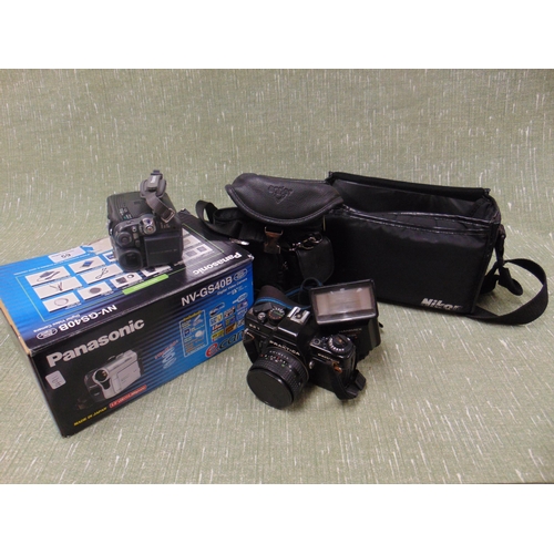 59 - Boxed Panasonic NV- GS40B digital video camera, one other , etc.