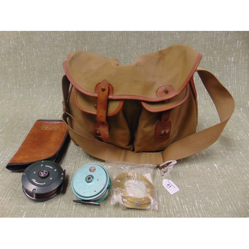 61 - Fishing tackle bag , containing a quantity of fishing tackle.