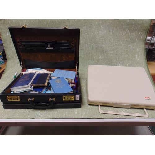 75 - Cased quantity of Masonic ephemera , together with an electric typewriter. (2).