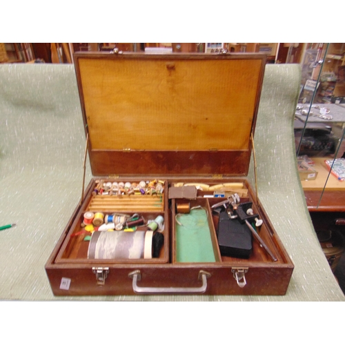 82 - Case containing a quantity of fly tying implements.