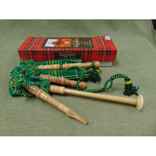 201 - Boxed junior bagpipes.