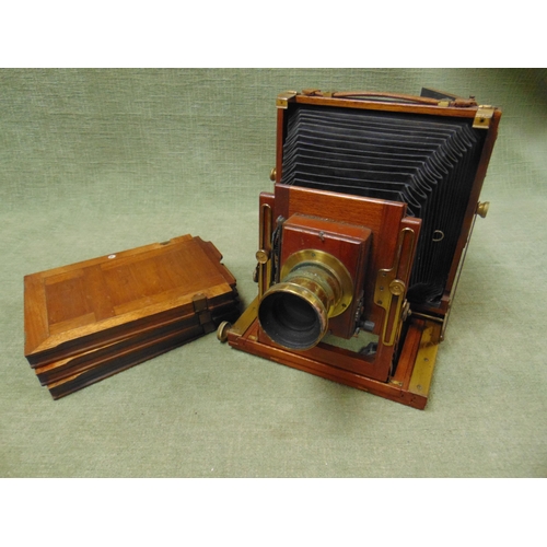 218 - Antique mahogany framed box camera and cover, having six spare plates and holders.