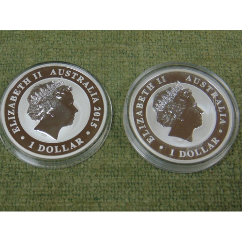 22 - Australian Kookaburra 10z.999 silver 1 dollar coin 2015, together with a 2017 example.