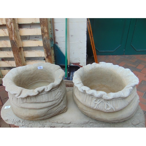 350 - Pair of novelty stoneware sack form garden planters, each 17