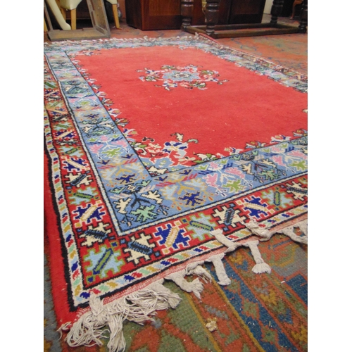 471 - Persian red and blue ground floral rug. 98 x 68