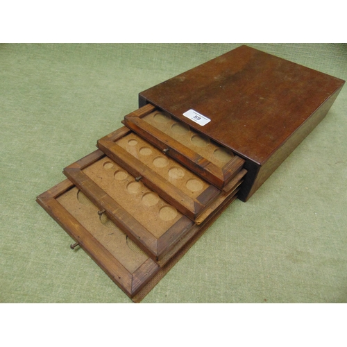 59 - Four drawer table top coin cabinet.