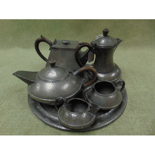 126 - Poston & Co pewter teapot, together with a four piece pewter tea set.