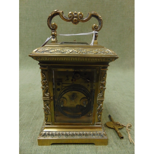 133 - Good  French antique brass cased carriage clock, having embossed decoration, enamel face and Roman n... 