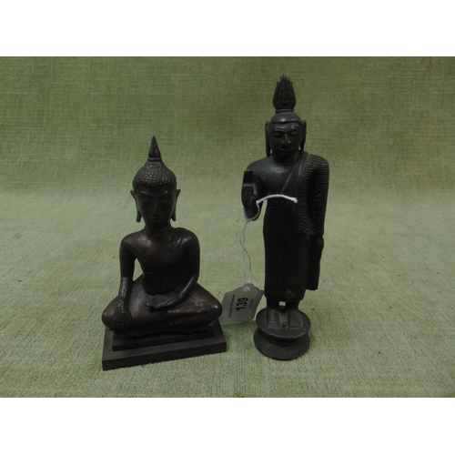 139 - Eastern metal figure of a deity and one other (2).