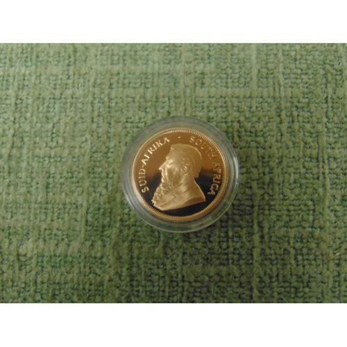 15 - Cased SA Mint 1998 1/4 oz gold Krugerrand.