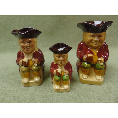 165 - Woods graduated set of three toby jugs.