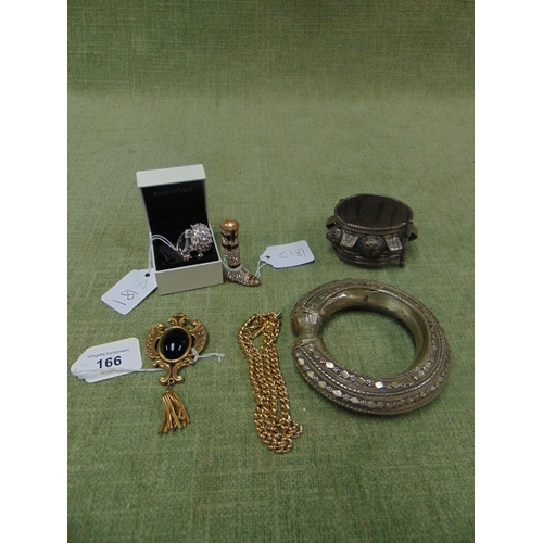 166 - Small selection of jewellery to include a silver ring, two eastern bangles, brooch, etc.