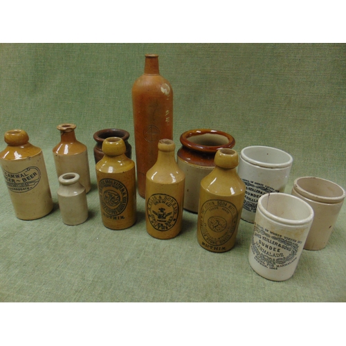 202 - Collection of stoneware bottles.