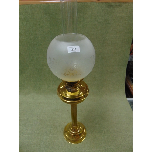 227 - Brass oil lamp, having etched glass shade.