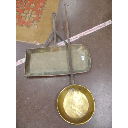 235 - Brass long handled pan and a similar copper example. (2).