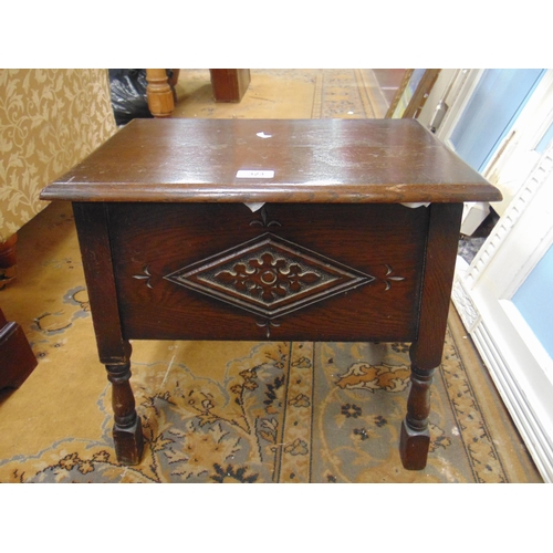 323 - An oak sewing box stool on baluster turned supports. 182 high.