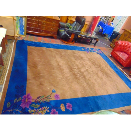 325 - Blue and brown coloured rug, having floral decoration. 139 x 106