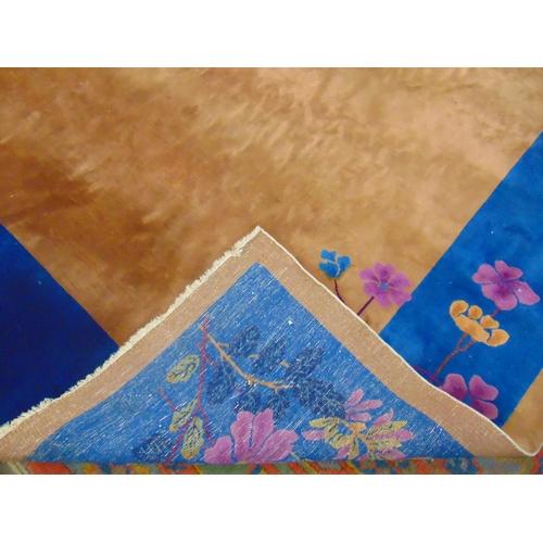 325 - Blue and brown coloured rug, having floral decoration. 139 x 106