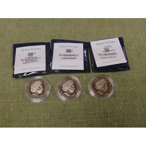 426 - Three Westminster Mint Queen Victoria 2001 Guernsey £5 proof coins.