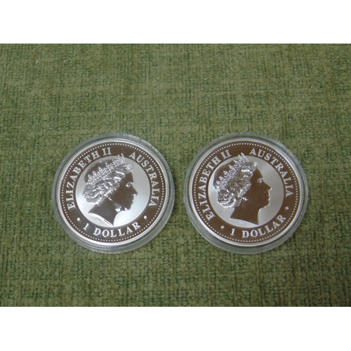 432 - Two Queen Elizabeth II 2000 silver $1 Kookaburra coins.