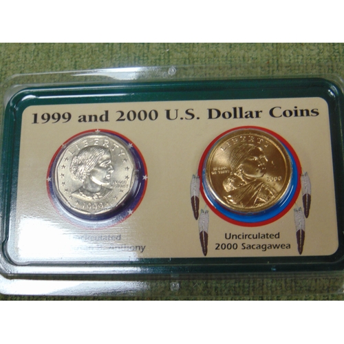 434 - Cased uncirculated 1999 and 2000 U.S. dollar coins.