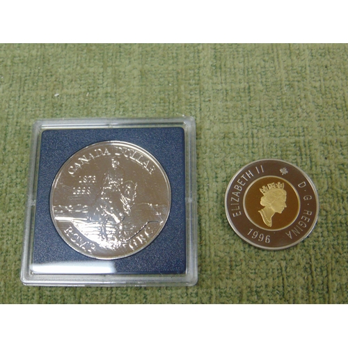 435 - Cased Canadian $2 1996 coin, together with a commemorative $1 coin. (2).