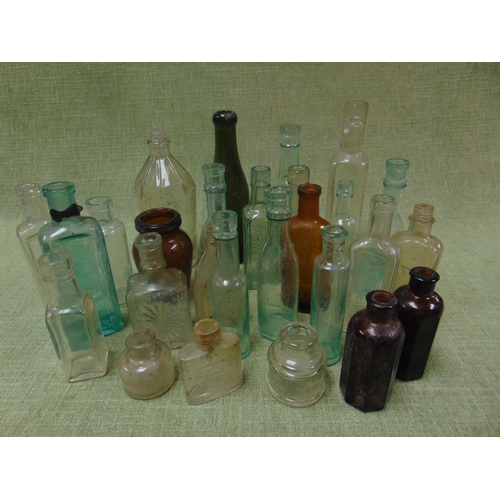 48 - Collection of antique glass bottles.