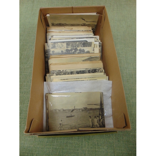 63 - Box of postcards.