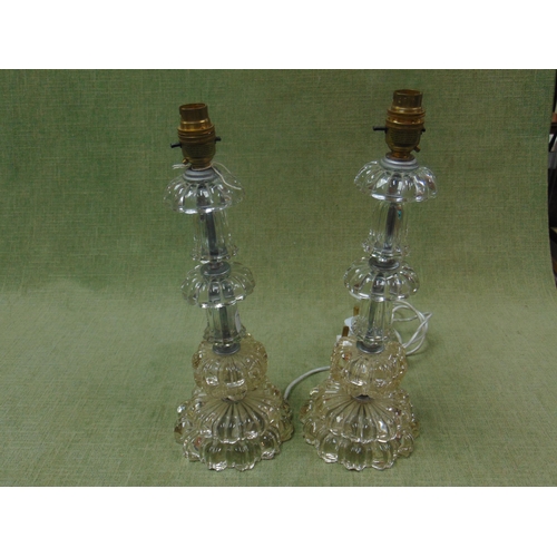 75 - Pair of moulded glass table lamps, each 14