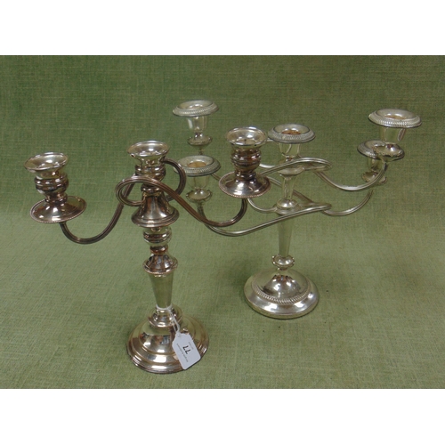 77 - Pair of silver plated twin branch candelabra. Each 11