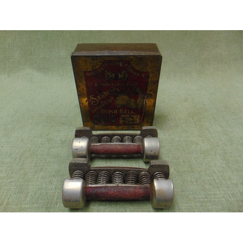 80 - Pair of Sandow's spring grip dumb bells, as supplied to King George V.