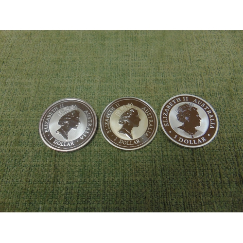 9 - Three  Queen Elizabeth II Australian $1 dollar Kookaburra silver coins, 1997, 1998 & 2022.