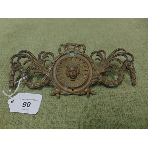 90 - Neo Classical style brass escutcheon, decorated with festoons suspended from a bow and central portr... 