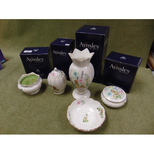 103 - Four boxed pieces of Aynsley china.