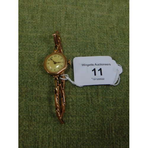 11 - Gold plated ladies wrist watch.