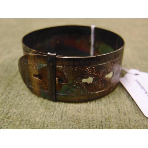 14 - Possibly white metal bangle.