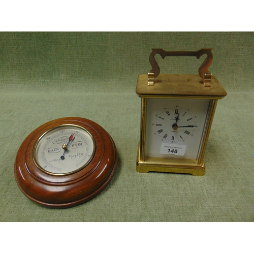 148 - Junghans mantle clock, together with a barometer. (2)