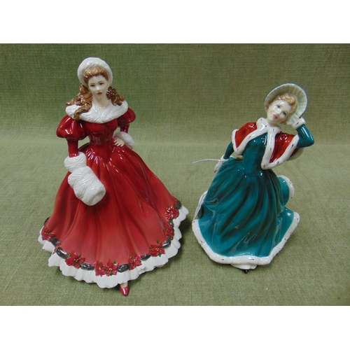 185 - Two Doulton classics figurines, Christmas day and Christmas morning.